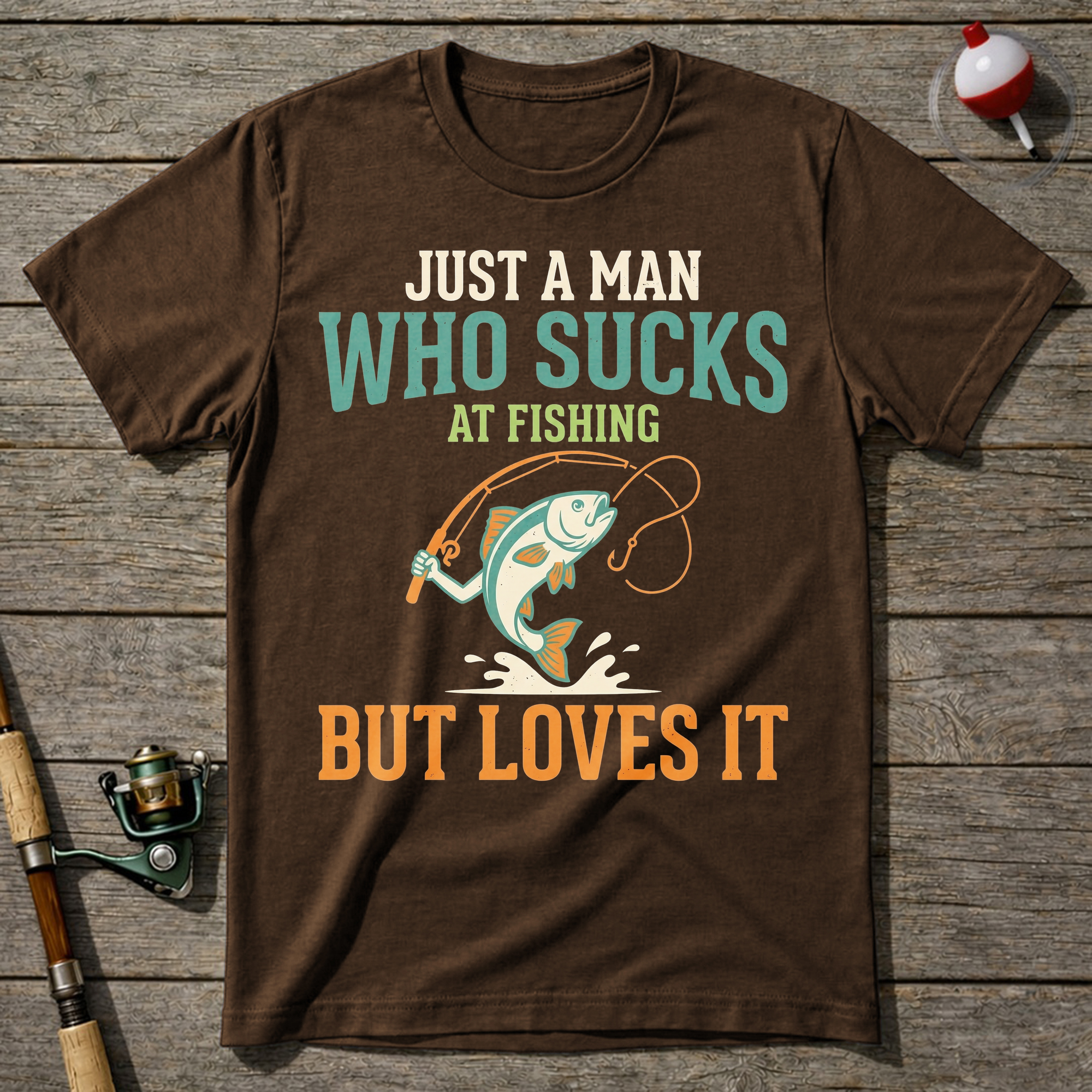 Sucks At Fishing But Loves It T-Shirt